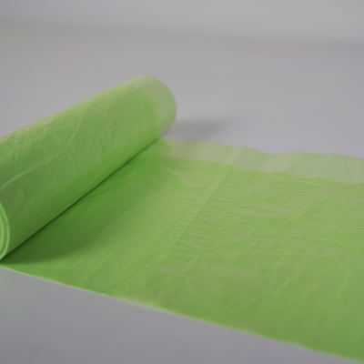 引き出し の 紐 で 閉め られる 色とりどりの HDPE 一回 使い捨て の ごみ袋