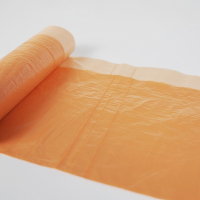 引き出し の 紐 で 閉め られる 色とりどりの HDPE 一回 使い捨て の ごみ袋