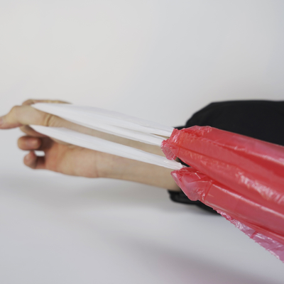引き出し の 紐 で 閉め られる 色とりどりの HDPE 一回 使い捨て の ごみ袋