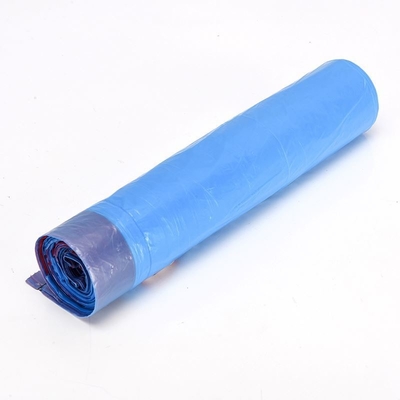 厚い 彩色 の 引き出し の 弦 の プラスチック 廃棄物 袋 の ロール 式 で 清潔 な 廃棄物 管理 を 目的 と し て