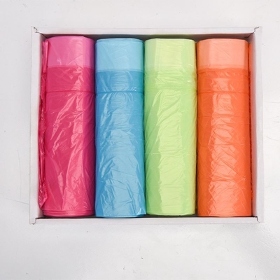 厚い 彩色 の 引き出し の 弦 の プラスチック 廃棄物 袋 の ロール 式 で 清潔 な 廃棄物 管理 を 目的 と し て